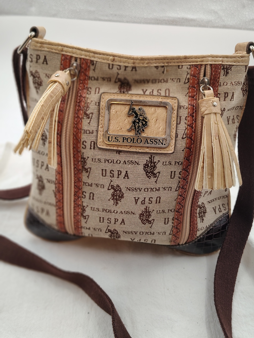 U.S. Polo Assn. Beige Canvas Crossbody with Brown Trim and Tassels